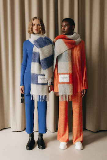 Berlin AW Shooting- Copenhagen Studios. Models are wearing a blue and an orange look. Both combined them with matching scarves.