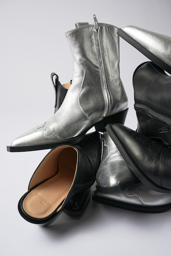 A staple of shoes with the brand new CPH244 in vitello silver on top.