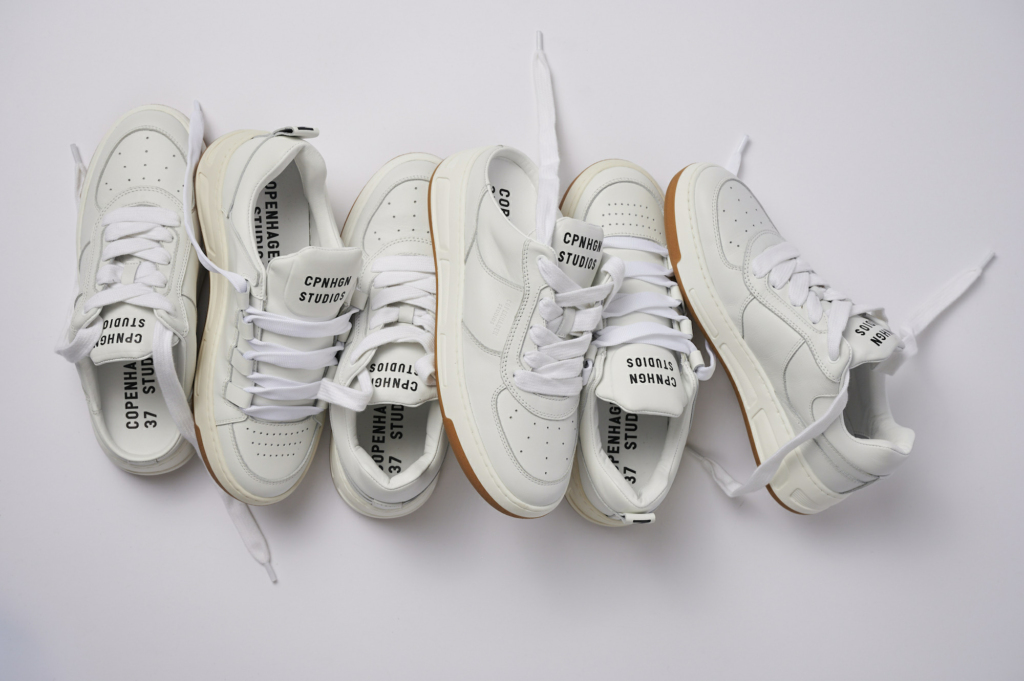 The picture shows our new retro skater collection - The CPH213 soft vitello white! The shoes are positioned next to each other and overlap at some points. 