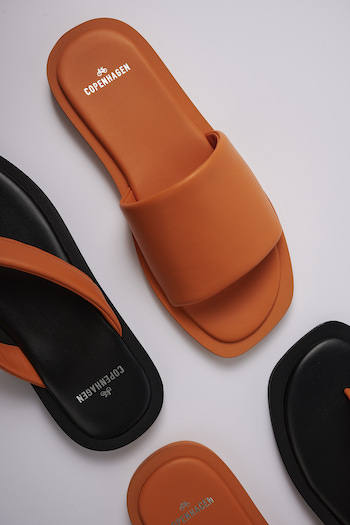 In the image one can see a studio close up of the CPH791 nappa amber orange and CPH789 nappa amber orange.