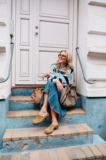 Maria wearing our CPH793 suede honey mules to a long denim skirt, striped long sleeve and a bag.