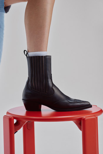 Close up of the "CPH284 x Toni Garrn used leather black" cowboy boots.