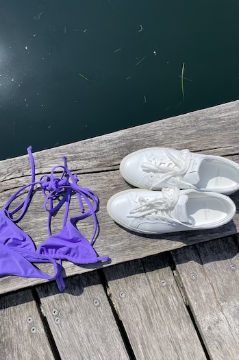 This image is a close up of a bikini and the CPH4 sneaker.