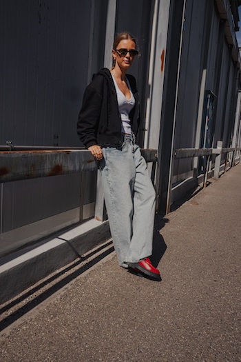 Spotted at CPHFW our CPH1012 leather red combined to wide leg jeans, a shirt and black jacket.