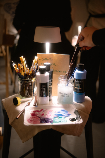 This image shows the paint and paintbrushes.